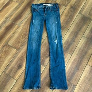 One pair of low rise boot cut jeans